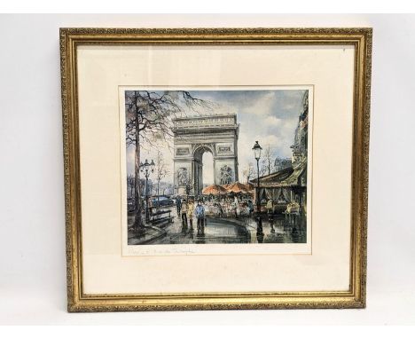 A print of Paris L' Arc de Triomphe signed Brunet. 54.5x50.5cm 