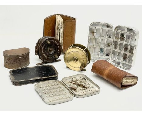 A quantity of 19th and 20th century fishing equipment. Including a Victorian brass reel etc. 