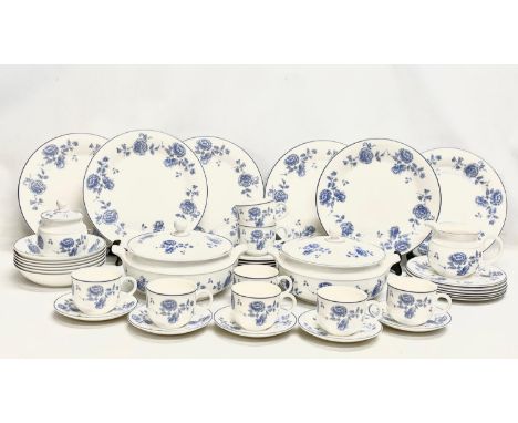 A 41 piece Royal Doulton ‘Expressions’ tea and dinner set. A pair of tureens, 6 dinner plates, 6 soup bowls, 6 salad plates, 