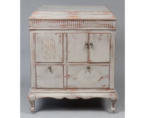 A light grey painted pine floor-standing gramophone cabinet enclosed by hinged lift-lid, with cupboard below enclosed by a pa