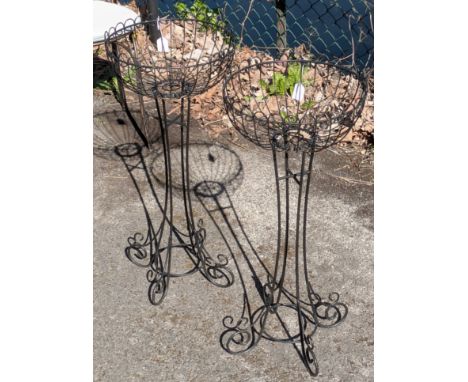 A pair of Victorian-style black finish wrought-metal plant stands, 80cm high; &amp; various cast-stone &amp; pottery garden o