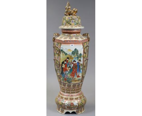 A Japanese-style large ceramic vase of six-sided form, having temple-dog finial to the cover, &amp; with bright-coloured figu