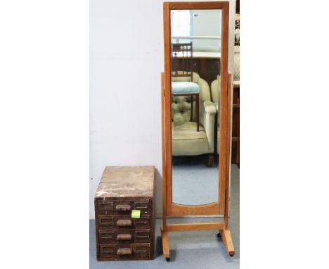 A light oak rectangular cheval mirror inset with a bevelled plate, &amp; with square supports &amp; block feet with ceramic c