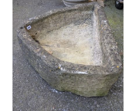 A sandstone corner trough, 75cm wide x 26cm high x 75cm deep.