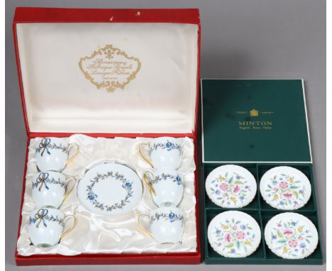 A Fabrique Royale Limoges floral decorated twelve-piece coffee service, cased; a set of four Minton’s “Haddon Hall” dishes, c