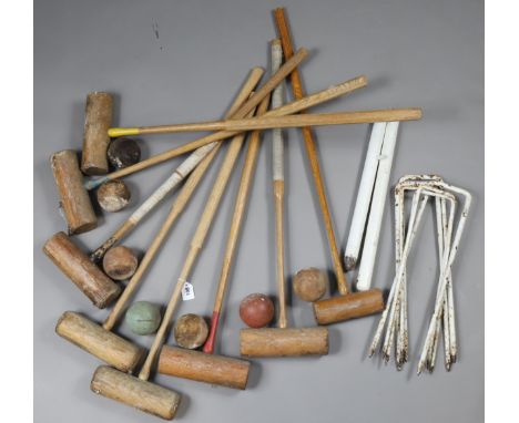 Eight vintage wooden croquet mallets; seven croquet balls; &amp; six croquet hoops. 