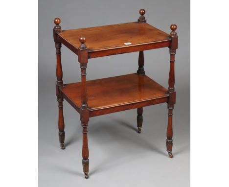 A 19th century mahogany rectangular two-tier whatnot with baluster-turned supports, &amp; on ceramic castors, 52cm wide x 75c