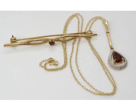 A 9ct gold ruby set bar brooch, length 5.5cm, together with a 9ct gold garnet and diamond accent pendant, length 3.5cm, lengt