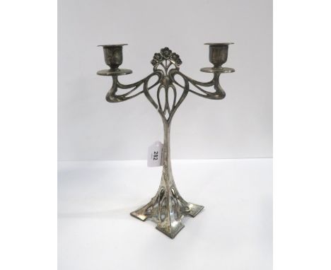 An Art Nouveau style candlestick Condition Report:Available upon request