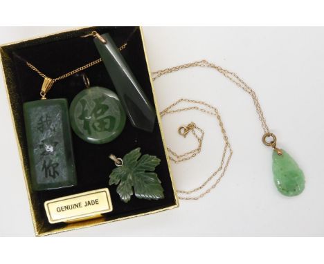 A carved Chinese green hardstone pendant with yellow metal bail and chain, together with a New Zealand jade pendant with 9ct 