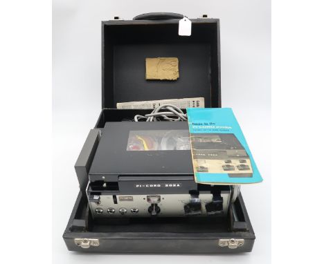 A FI-CHORD 202A portable reel to reel tape recorder with music tapes, power pack etc Condition Report:Available upon request