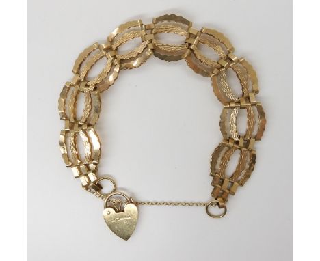 A 9ct gold gate bracelet, length 19cm, weight 10.2gms Condition Report:Available upon request