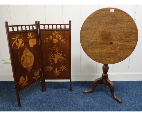 A Victorian mahogany circular tilt top table on tripod base and a mahogany inlaid two tier screen (2) Condition Report:Availa