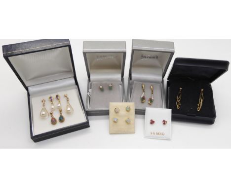 A pair of 9ct gold Ortak earrings together with a collection of gold and yellow metal earrings to include opals, emerald, rub