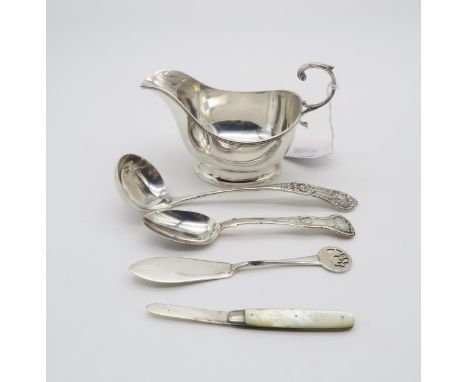 a collecting of silver including a silver sauce boat, with a flying scroll handle, by Adie Brothers Ltd, Birmingham 1935, a s