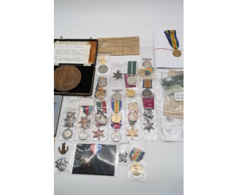 WWI MEDALS badges, replica medals, WW II Stars, India and Pakistan medals, MBE, Death plaque WWI etc Condition Report:Availab