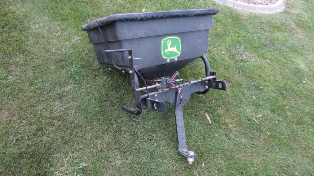 John Deere electric broadcast spreader for mower mounts on rear of JD