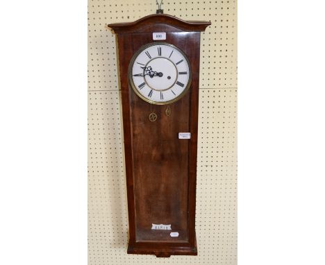 A Vienna regulator type wall clock, the 19 cm diameter enamel with Roman numerals, in a mahogany case, 29.5 cm wide

Report b