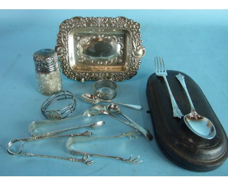 A silver christening spoon and fork, cased, London 1894, three pairs of silver sugar tongs and other small silver, ___6oz.