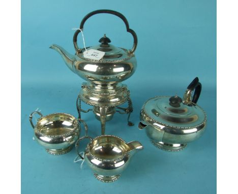 A silver four-piece tea service, comprising: teapot, spirit kettle, cream jug and sugar bowl, of bellied form, by Walker & Ha