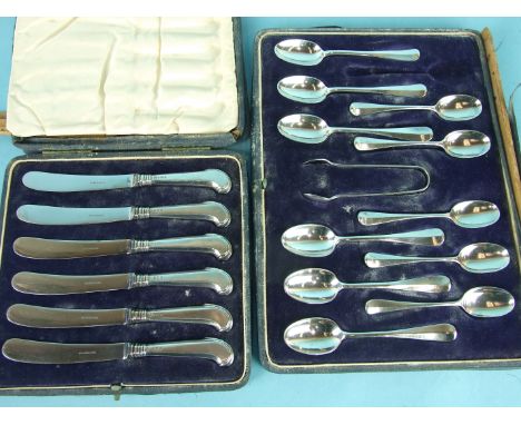 A case of eleven silver rat tail teaspoons and sugar tongs, London 1911 and a cased set of six silver pistol-handled tea kniv