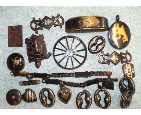 Two Victorian tortoiseshell pique heart pendants, (one af), a tortoiseshell locket pendant, a tortoiseshell watch chain (af) 