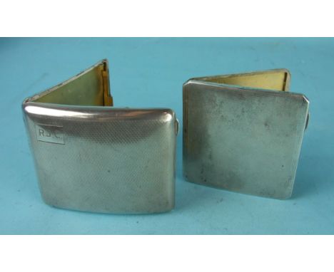 Two engine turned silver cigarette cases, ___6oz.
