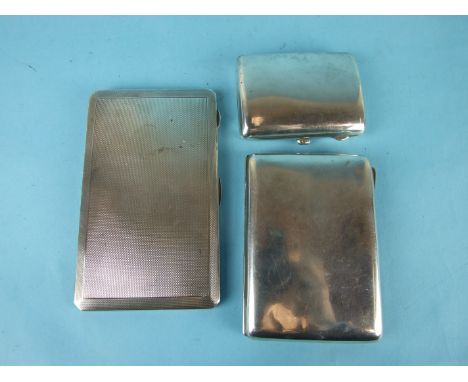 An engine-turned silver cigarette case, Birmingham 1937 and two other silver cigarette cases, (one a/f), ___12.8oz, (3).