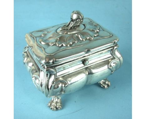 A Continental silver tea caddy of lobed squat form, the lid with pomegranate finial, (hinge damaged) above foliate corners an