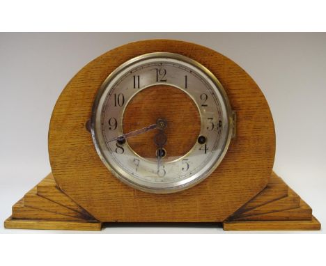 An Art Deco oak mantel clock