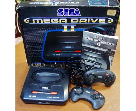 A boxed Sega Megadrive II, comprising console, two controllers and instructions