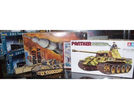 An Airfix Apollo-Saturn V part constructed, boxed; a Tamiya Panther 1/35 scale, unopened, pictorial box; a Tamiya motorised T