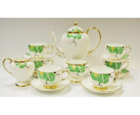 A Paragon Art Deco hand painted coffee set for six comprising coffee pot, creamer, sucrier, six coffee cups and saucers