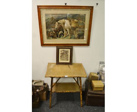 A late 19th century bamboo occasional table with under tier, an accompanying black and white photograph of the original owner