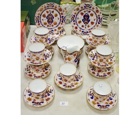 A Derby style part tea service including cups, saucers, tea plates, milk, sugar