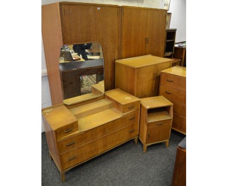 A mid-20th century Lebus Link six piece bedroom suite comprising two wardrobes, dressing table, chest, small linen press and 