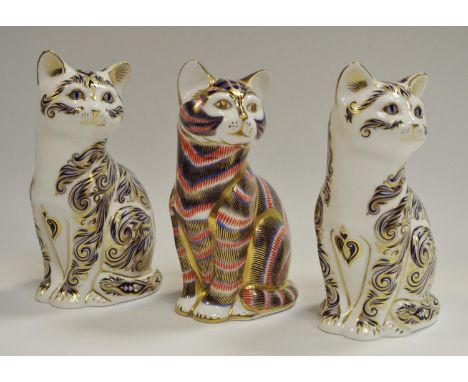 Two Royal Crown Derby limited edition Majestic Cat paperweights, first quality No. 3044/3050 and 3085/3500; another cat, no s