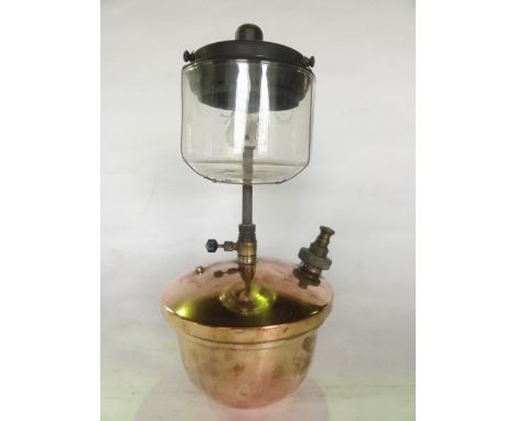 A Tilley lamp with copper fount base supporting a Pyrex heat resistant shade No 171, 34 cm tall approx