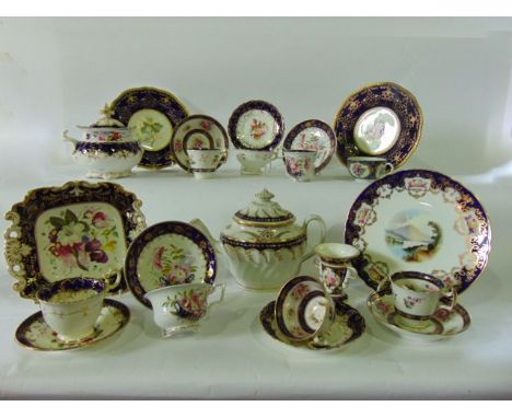 A collection of 19th century tea wares with painted floral decoration within blue and gilt borders including sucrier, two han