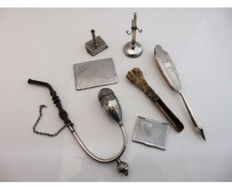 A silver and mother-of-pearl ring stand, Adie & Lovekin Ltd, Chester, 1924, loaded; a silver nail buffer, Birmingham, 1930; a