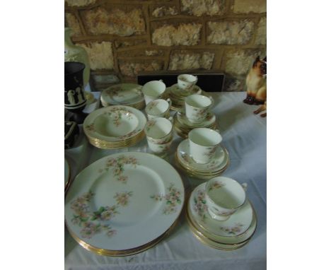 A quantity of Coalport dinner and teawares with apple blossom decoration including 6 dinner plates, six side plates, six dess