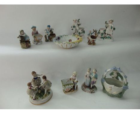 A quantity of late 19th century and other continental ceramic figures including a pair of vases with encrusted forget me not 