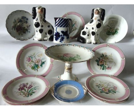 A collection of 19th century ceramics including a pair of Staffordshire spaniels with black and white painted patches, seven 