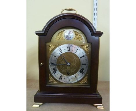 A reproduction bracket clock by Elliott of London, the three train movement with chime/silent selector set within a Georgian 