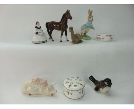 A Beswick group of a sow with piglet on her back together with a German model of a horse, a Beswick Beneagles Scotch Whisky f