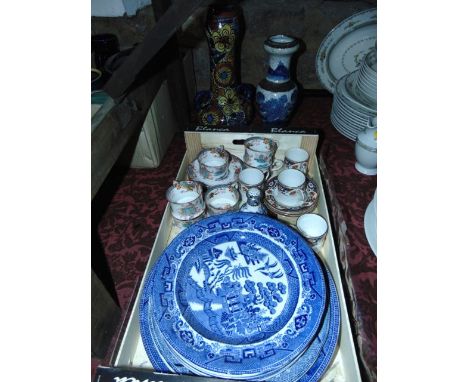 A late 19th century oriental vase with crackle glaze finish and blue and white painted decoration, a two handled vase with po