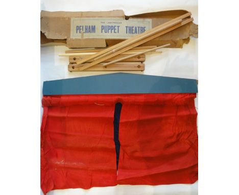 The Lightweight Pelham puppet theatre with original cardboard box, the theatre in a blue and red colourway