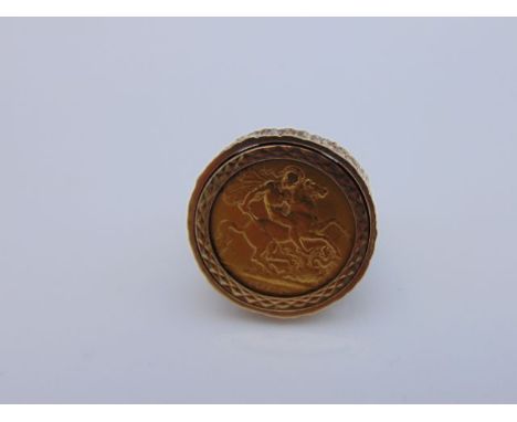 A half sovereign inset ring, 1905, the 9ct gold band of open worked textured form, 10g, size O 1/2