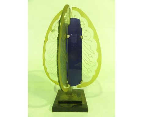 A decorative Art Deco lamp, the chromium stand supporting a four sided cobalt blue glass interior flanked by semi-ovoid clear