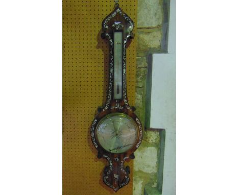 A mid 19th century rosewood wheel barometer inlaid with trailing floral frieze in mother-of-pearl - with silvered dials